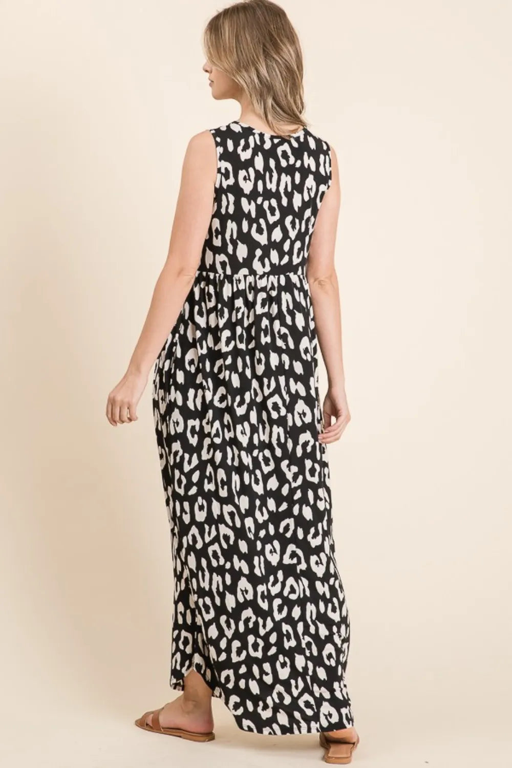 Black leopard print maxi dress with pockets side view