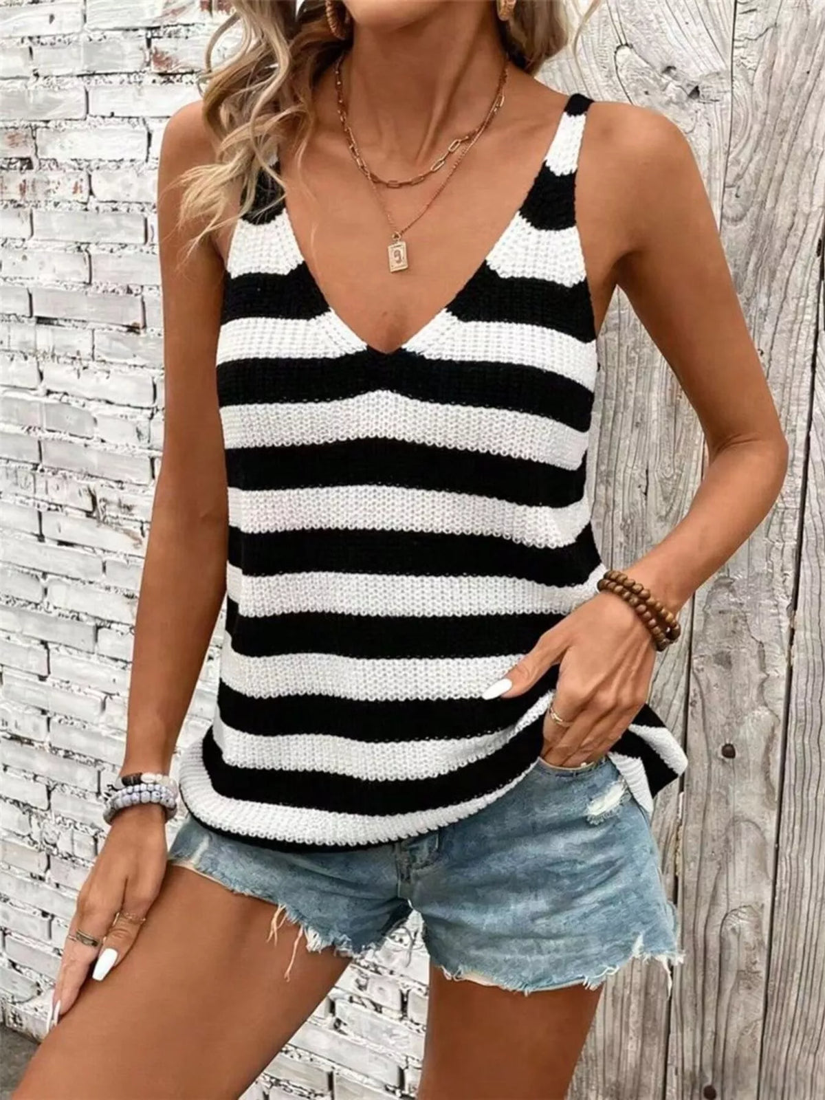 Womens striped tank top angled styling view