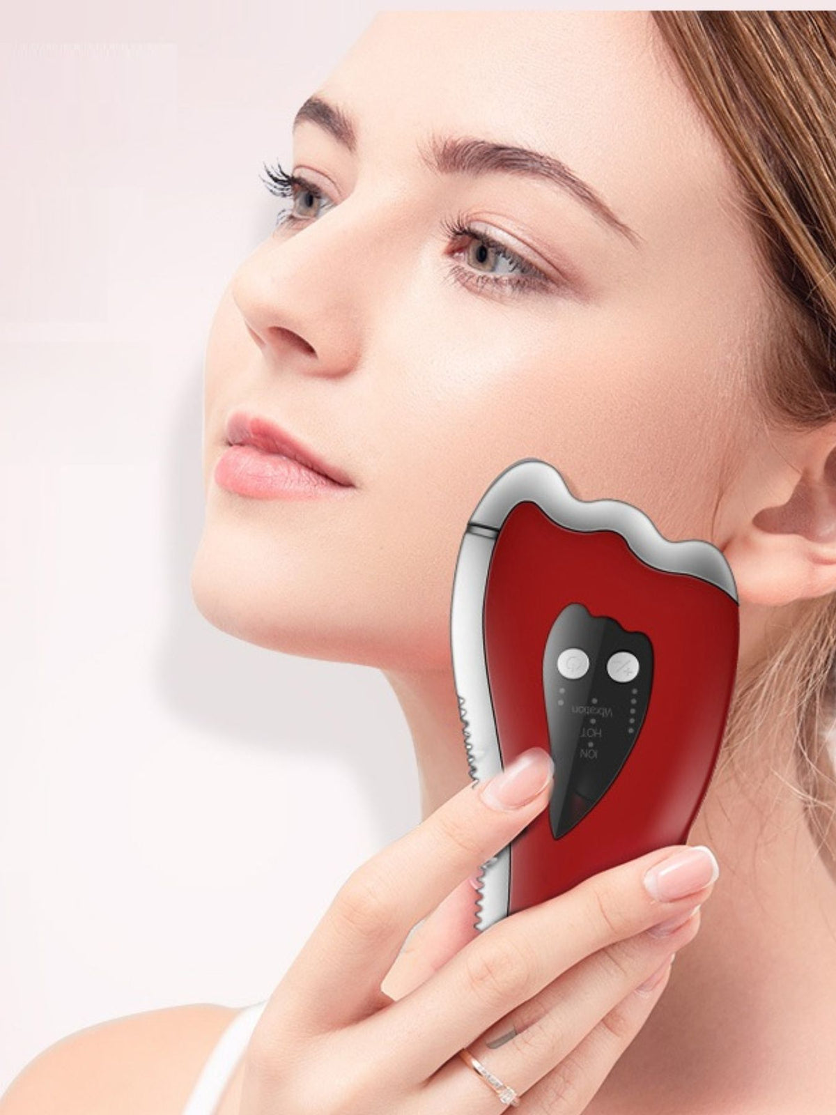 Facial beauty device in red
