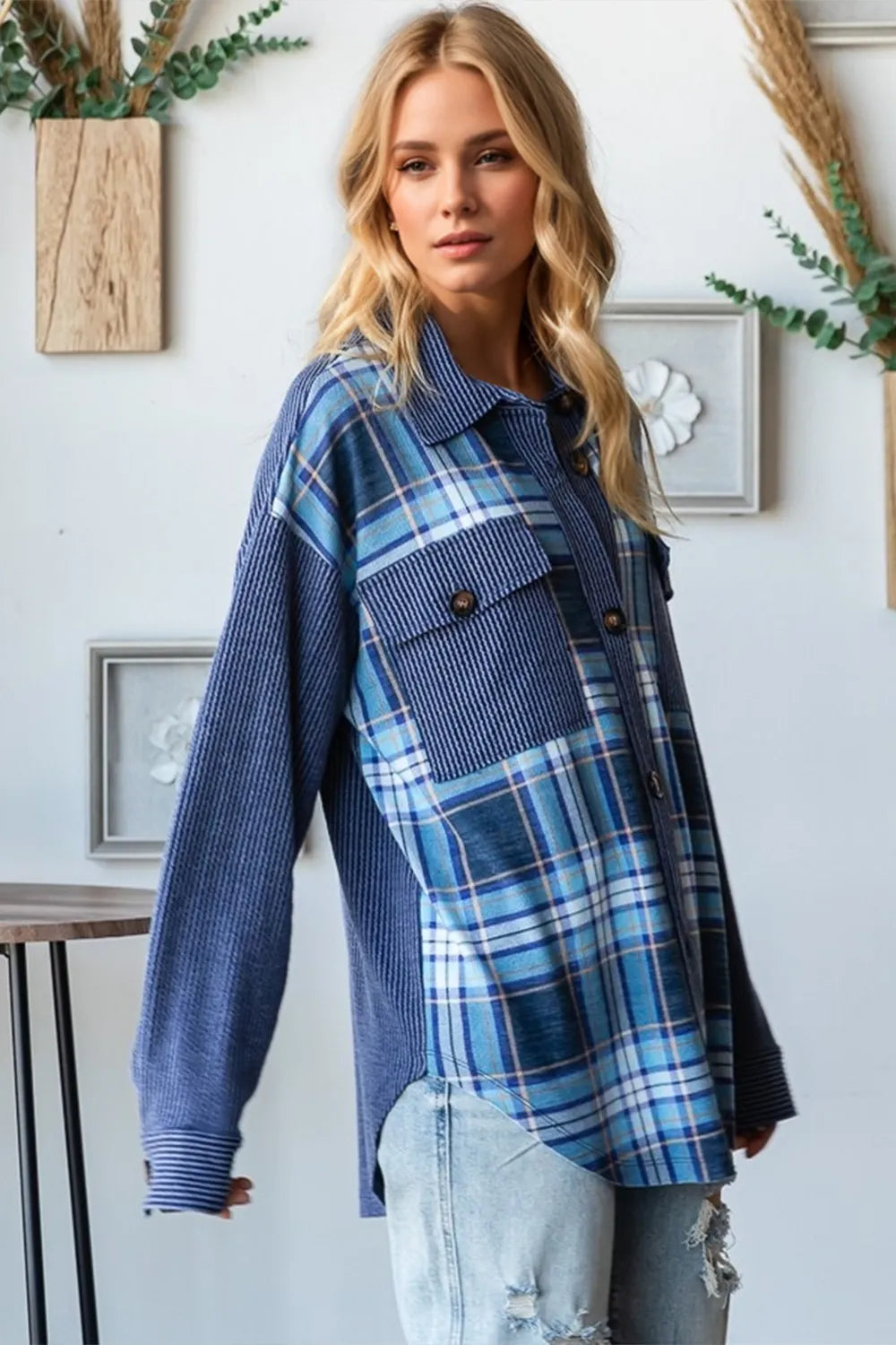 Plaid shacket showing breast pockets and button front