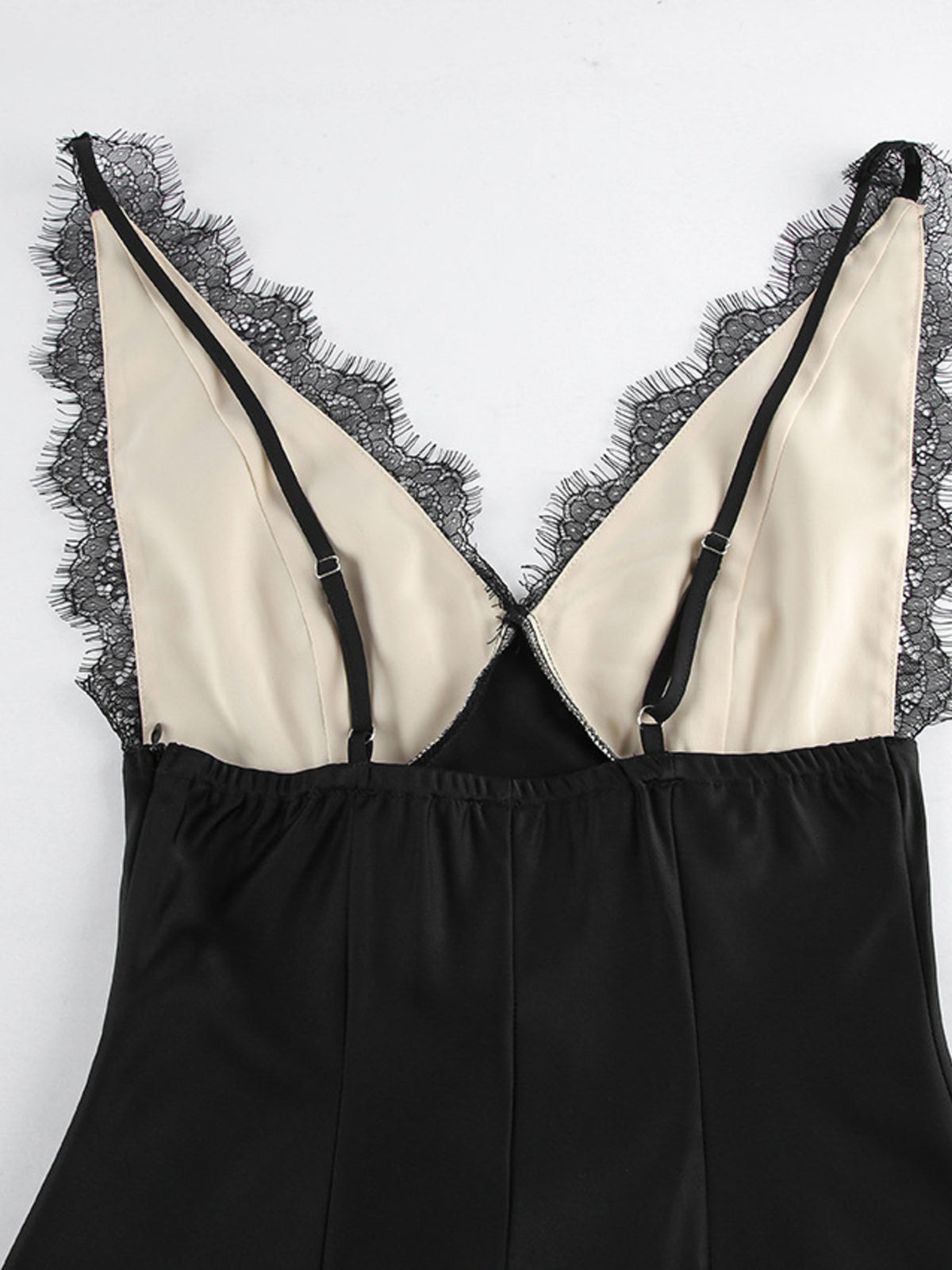Black slip midi dress on model