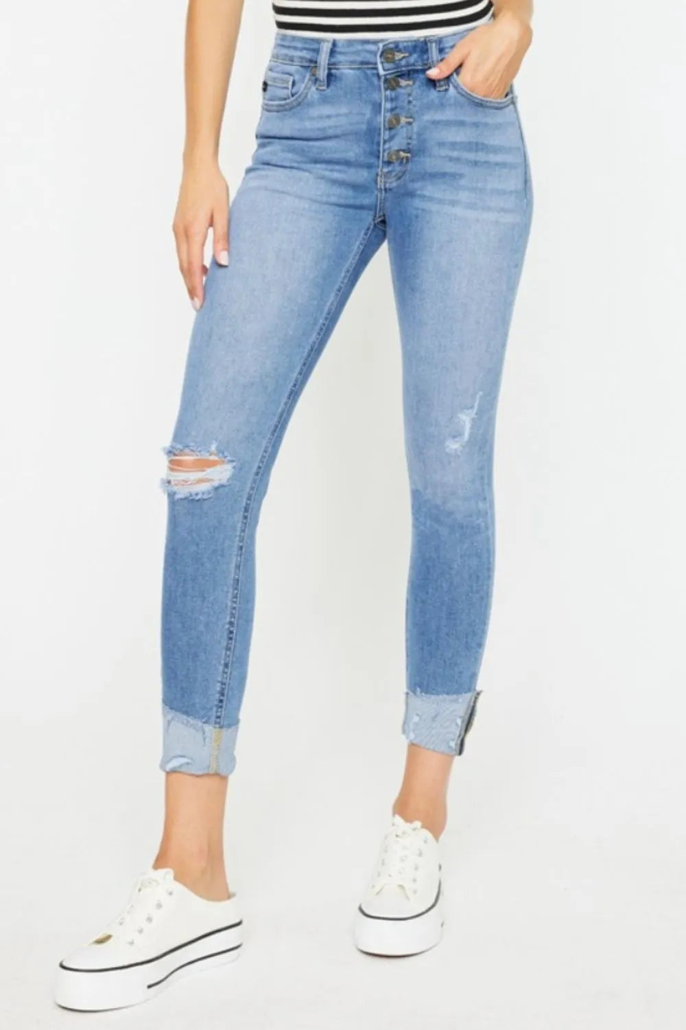 Distressed cat whisker button fly jeans front view