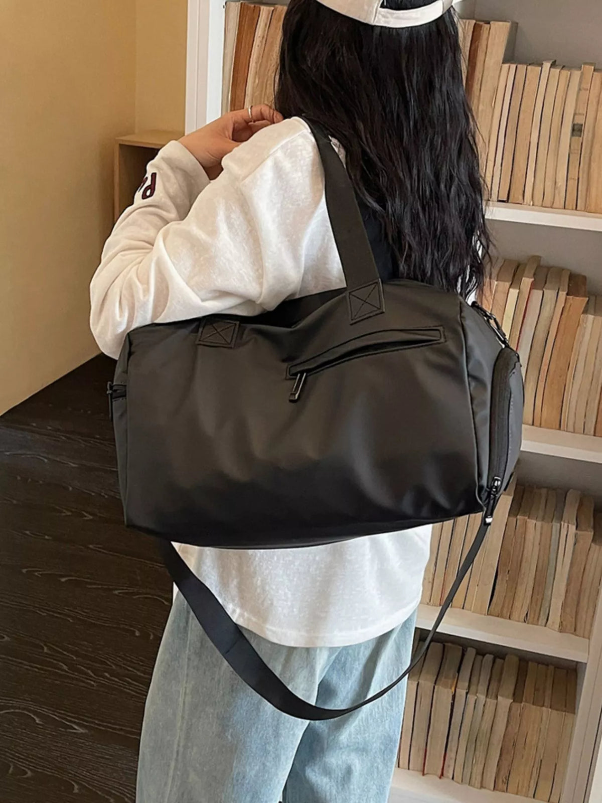 Black multi pocket Oxford travel duffel front view