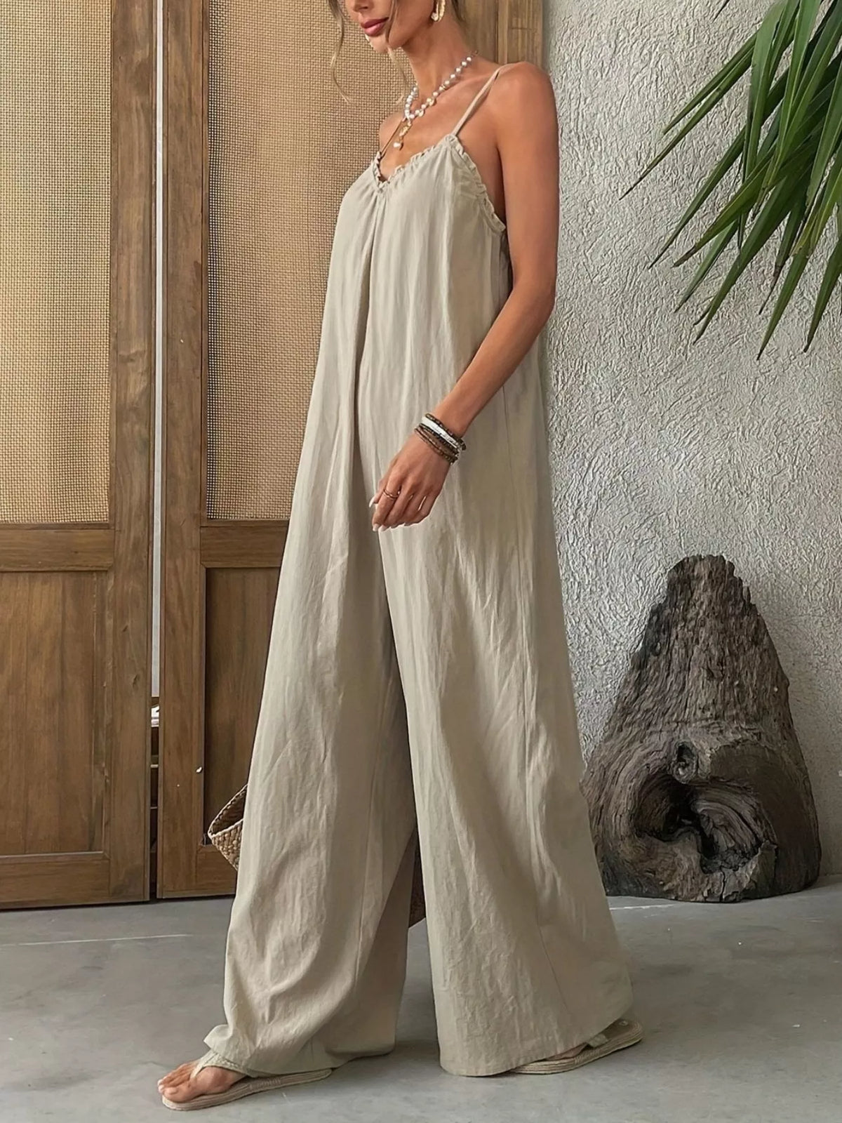 khaki sleeveless wide leg jumpsuit detail