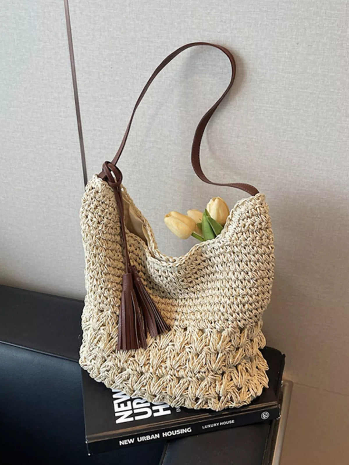 Tassel detail on cream white straw shoulder bag