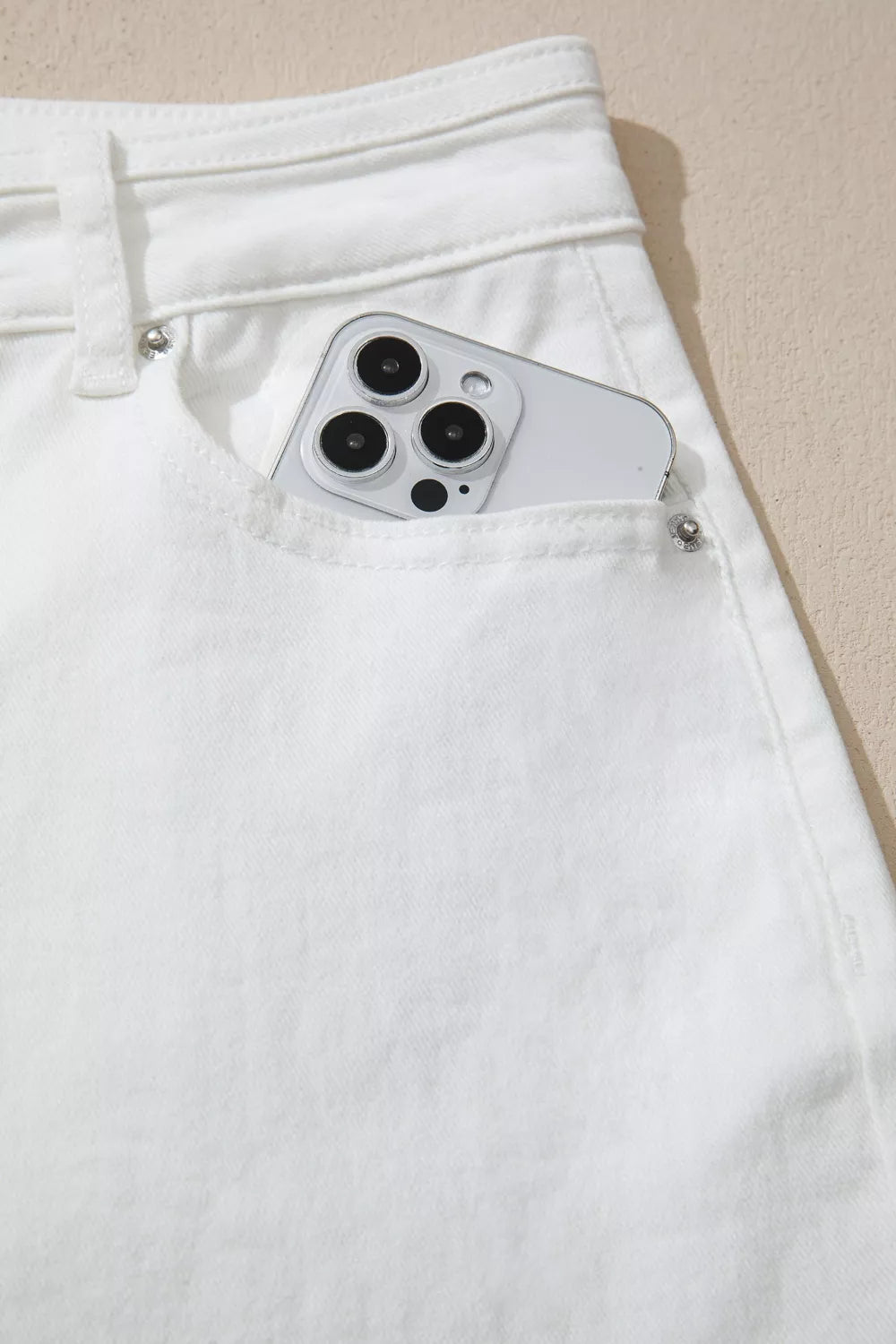 White wide leg denim hem detail