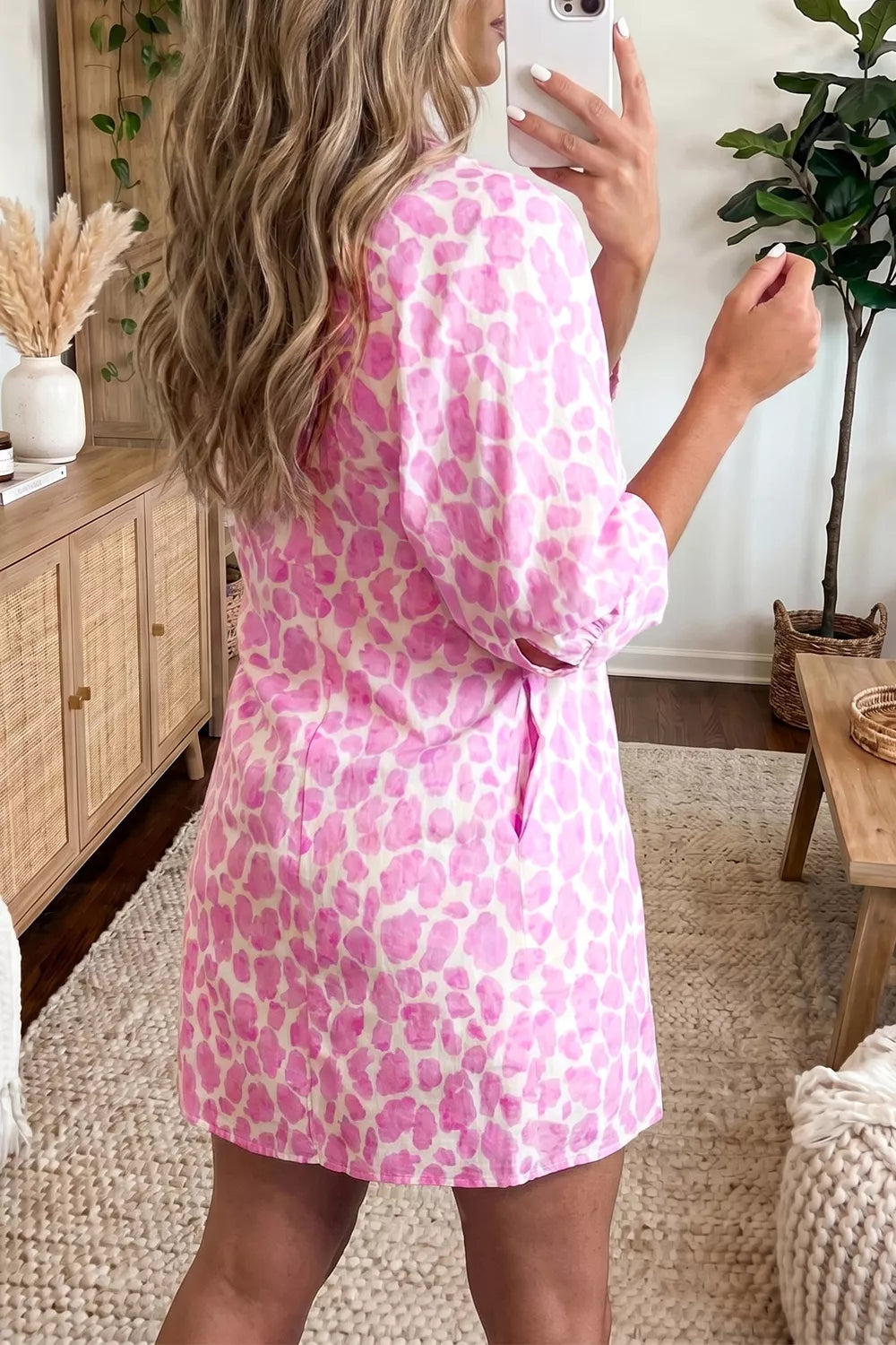 Pink leopard print mini shirt dress back view