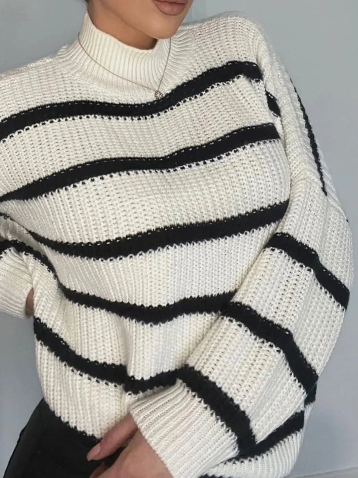 Striped turtleneck in khaki colorway