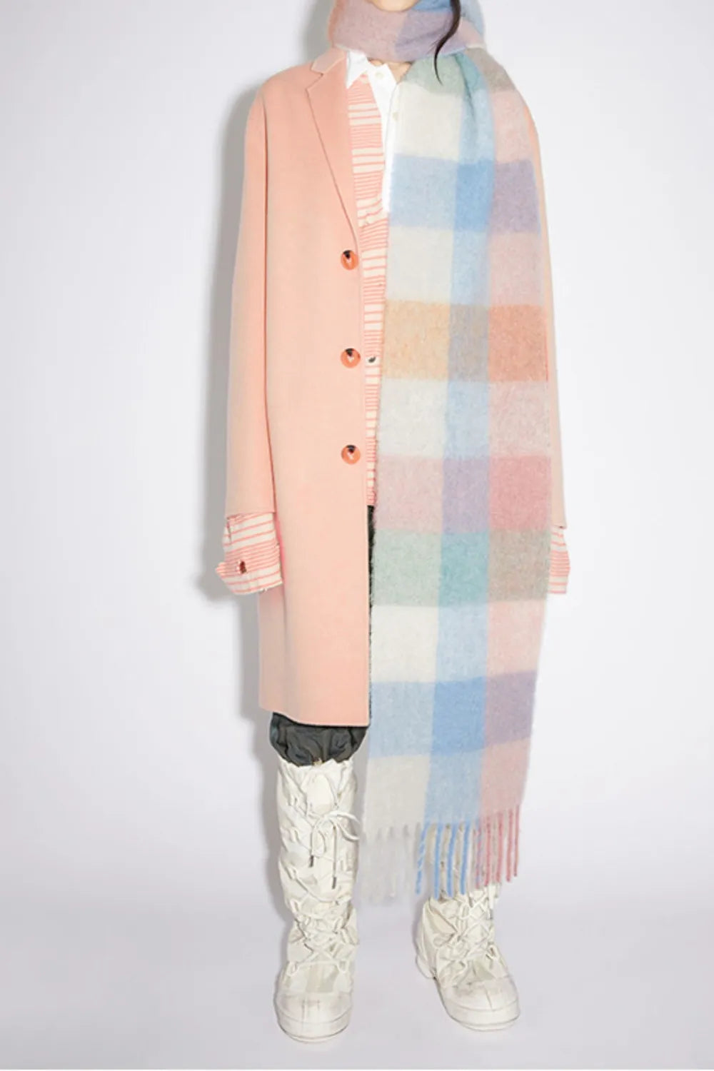Checked fringe scarf shown in natural light