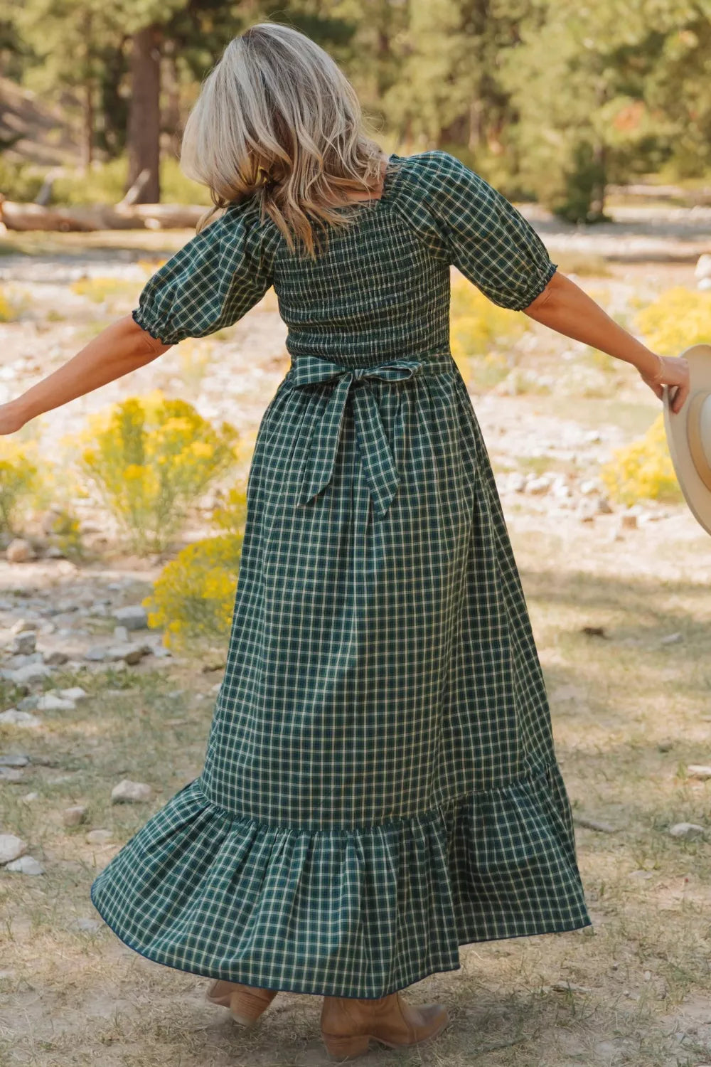 Square neck and smocked bodice detail on the plaid dress