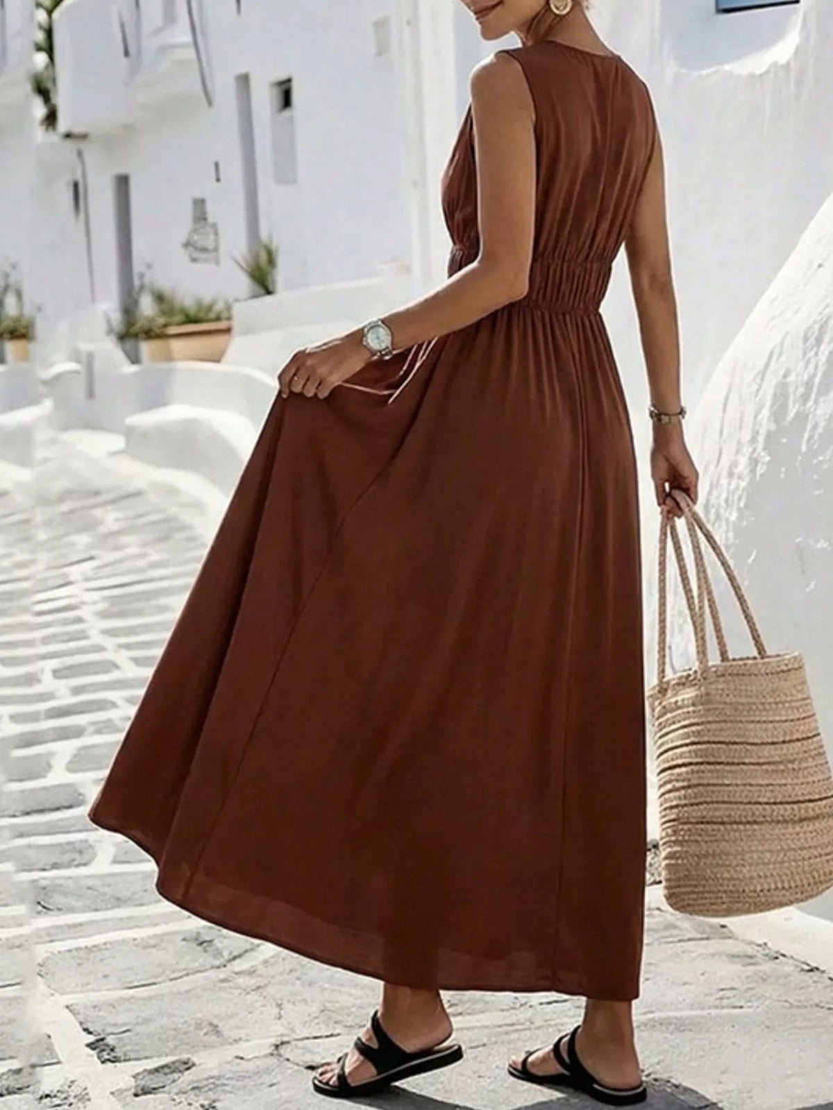 Back view of the brown V neck maxi dress