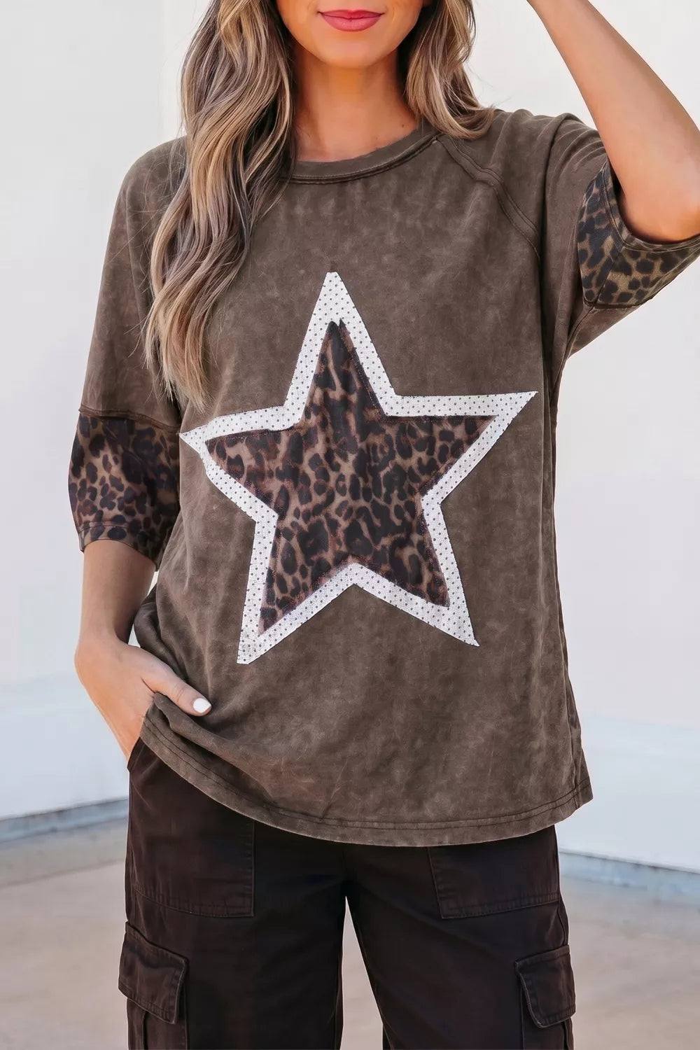 Back view of the leopard star patch tee
