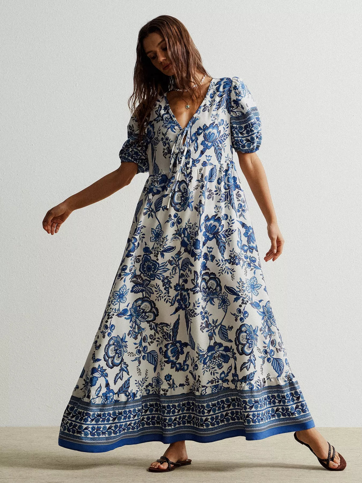 floral tie neck puff sleeve maxi dress in navy fabric detail