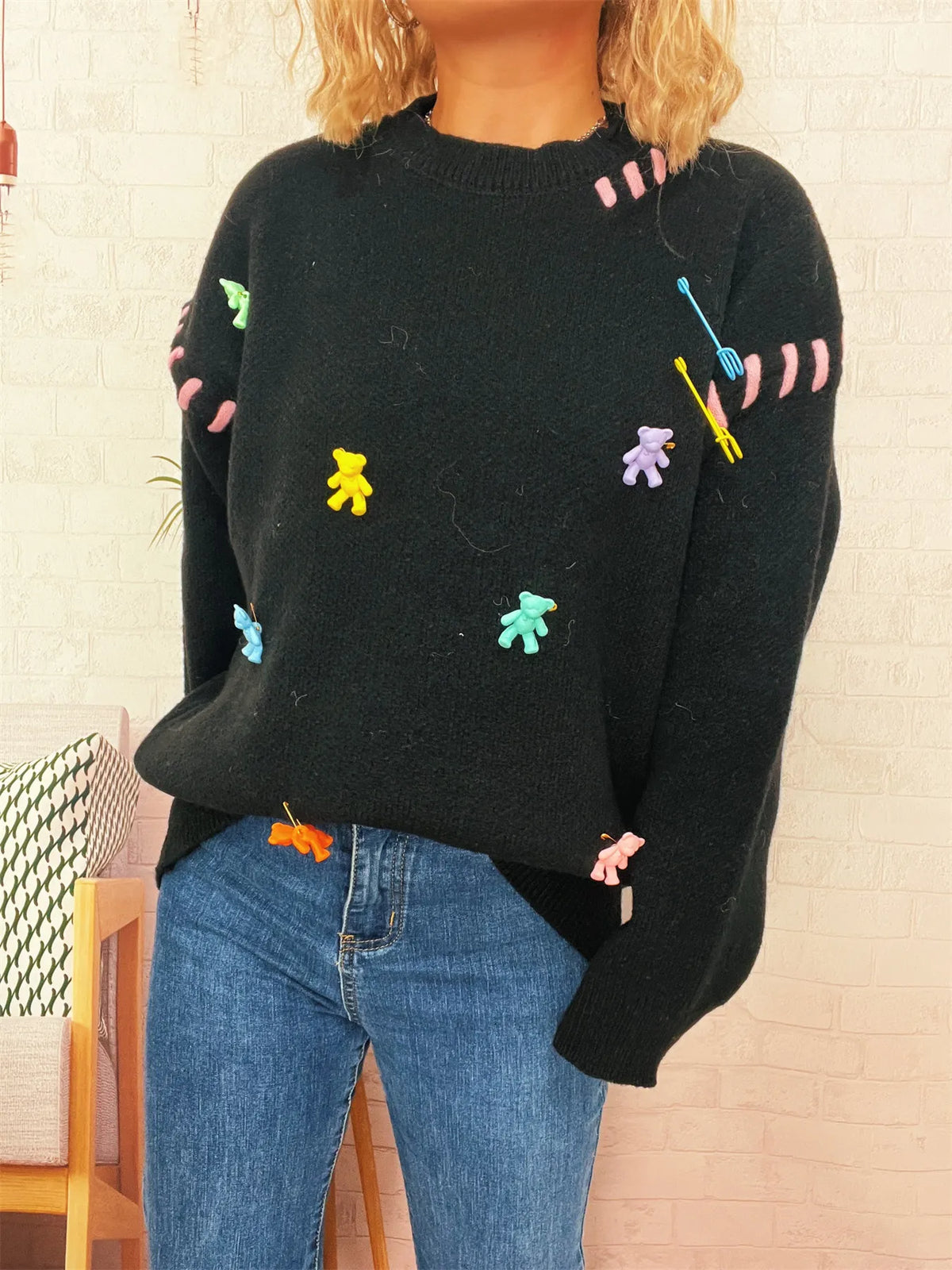 bear applique round neck sweater seated styling view