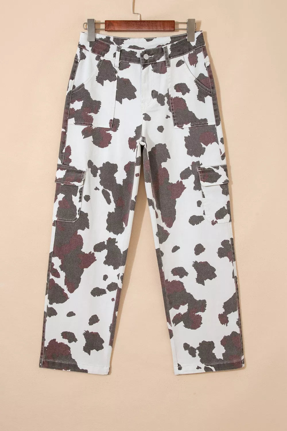 Close up of cow spot print detail on denim