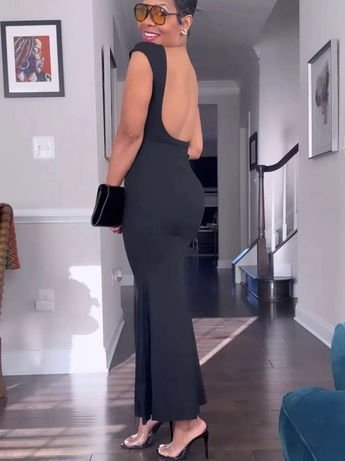 Styling view of the womens backless cap sleeve maxi dress