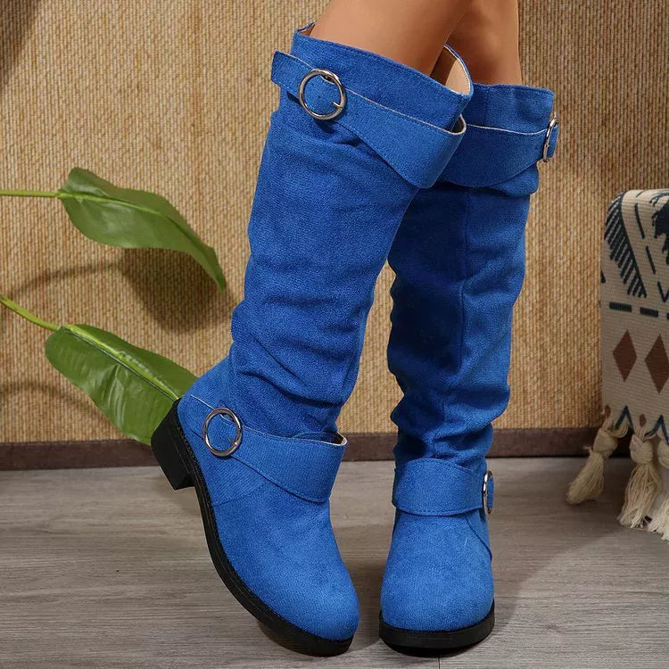 Orange buckle accent slouch boots worn on model