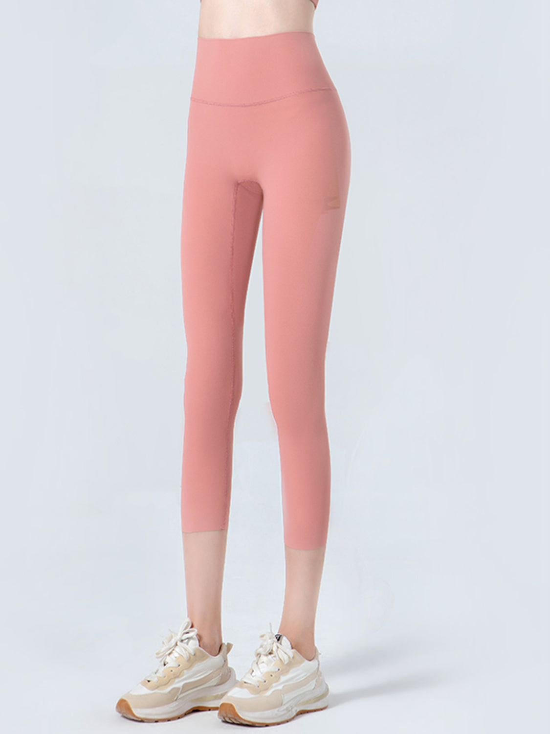 Wide waistband cropped sports leggings styled front view