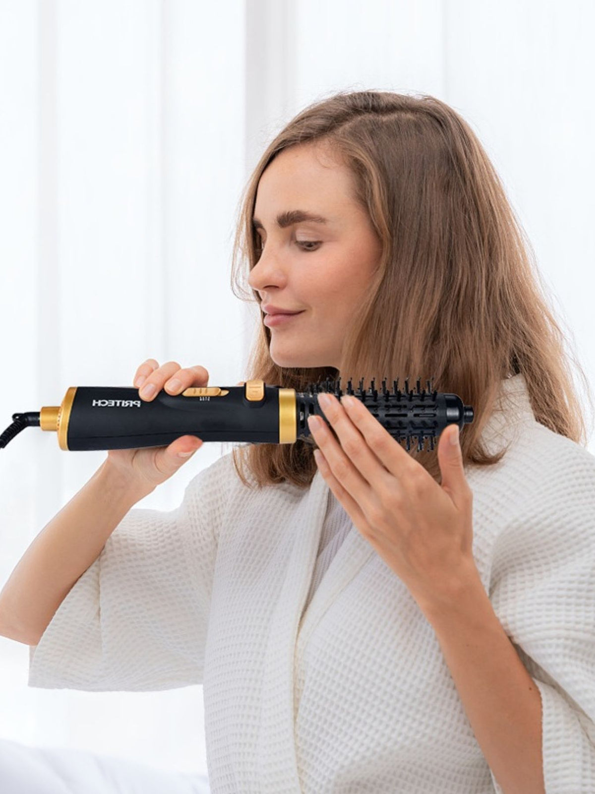 Volumizing brush creating bouncy curls