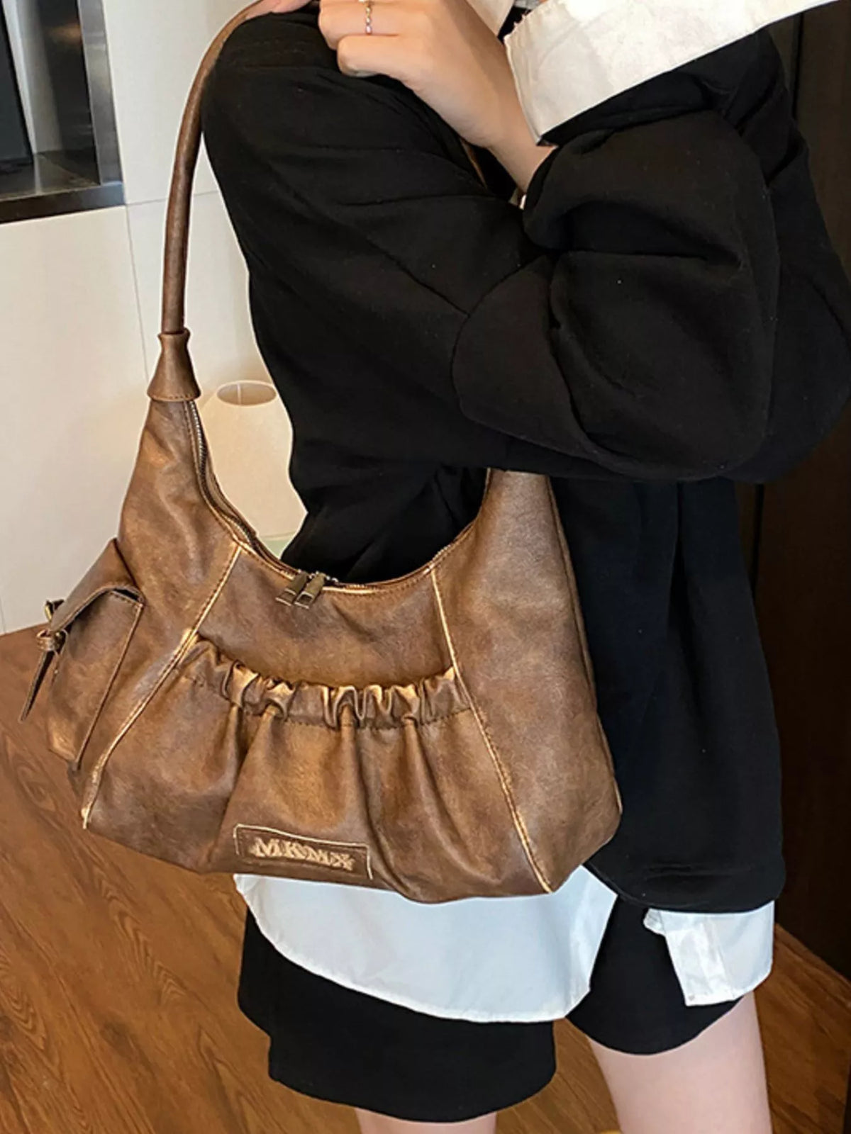 Interior view of the ruched hobo bag
