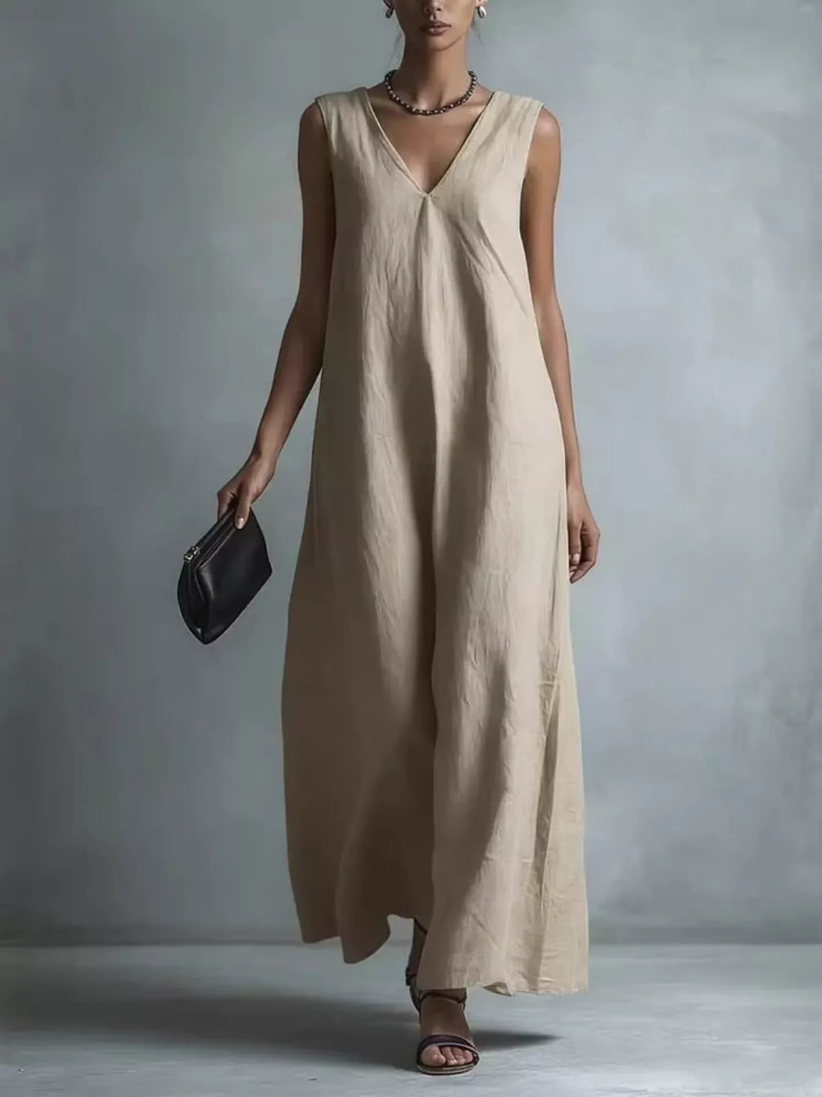 Close view of the V neckline and shoulder of the maxi dress