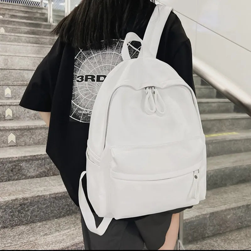 Faux leather zip backpack overhead view