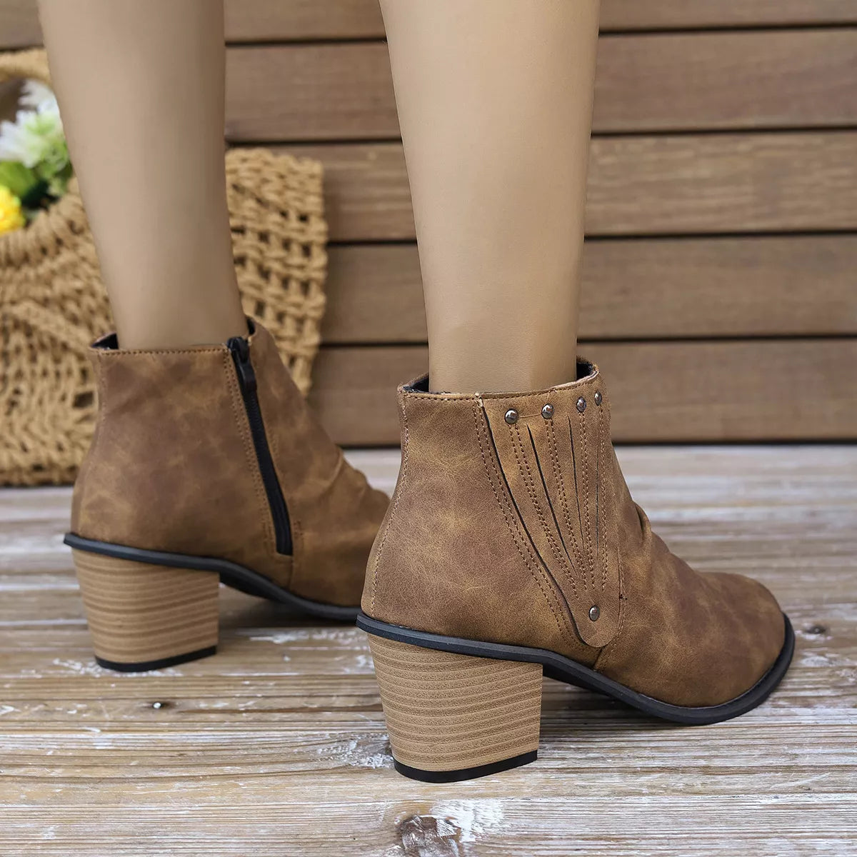 Suede point toe block heel boots angled pair