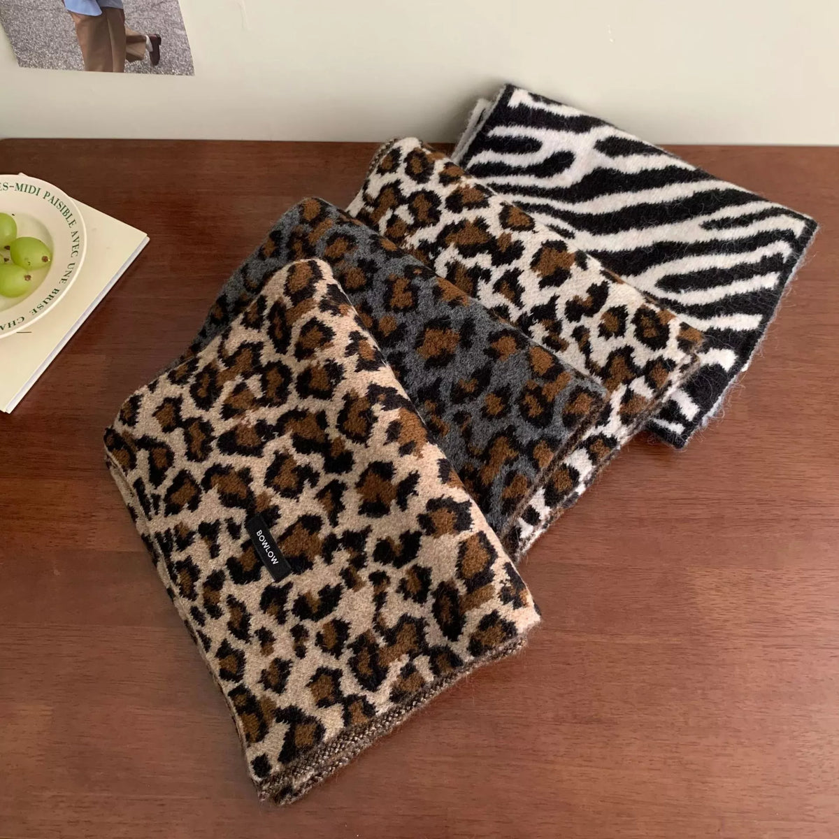 Animal print scarf shown in one print style