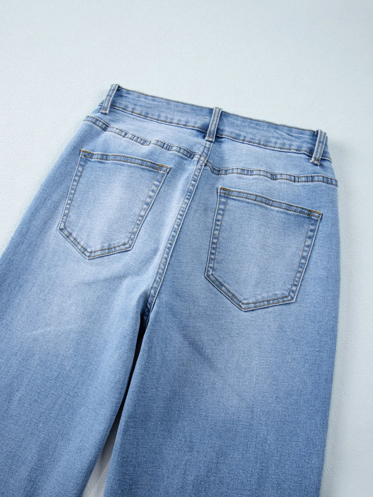 Side view of high waist wide leg jeans