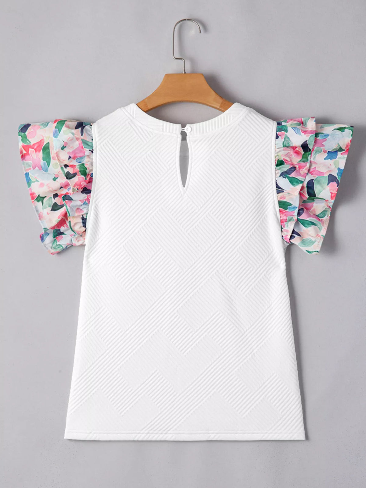 White abstract print tiered ruffle sleeve top front view