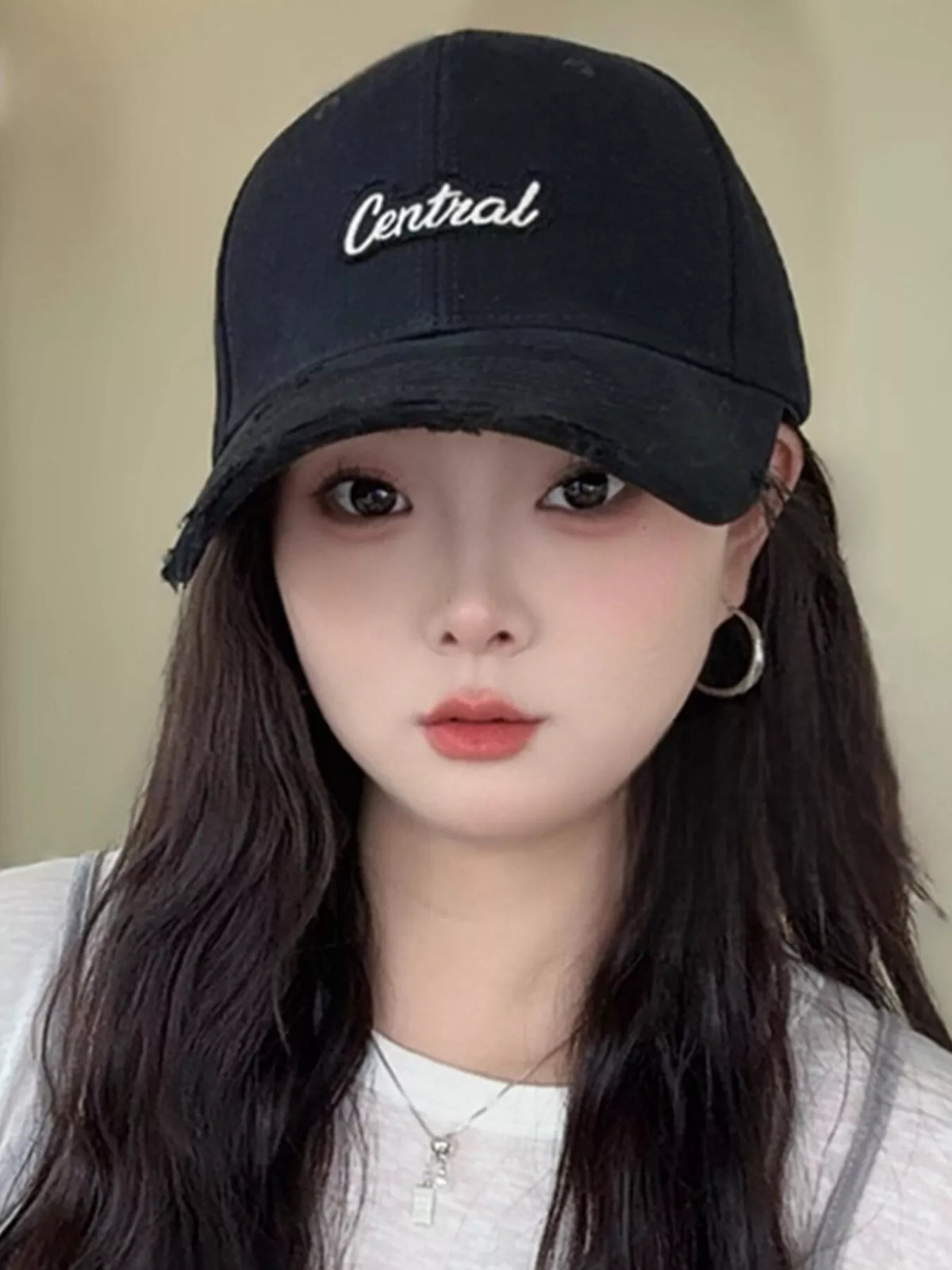Worn panel and brim texture on a distressed cap
