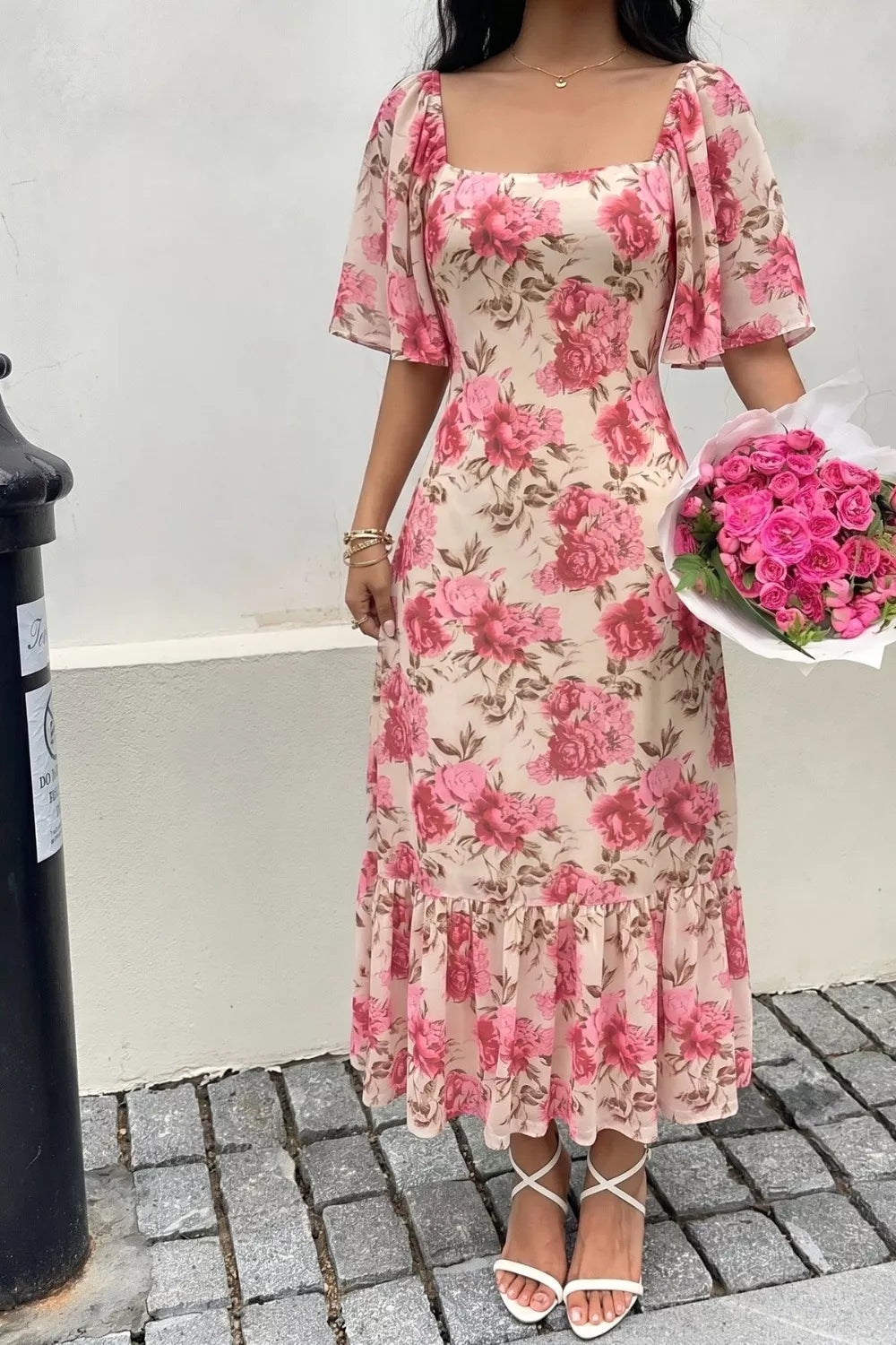 Floral ruffle hem tie waist dress back view