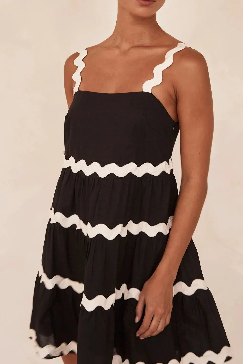 Black contrast trim tiered dress side view