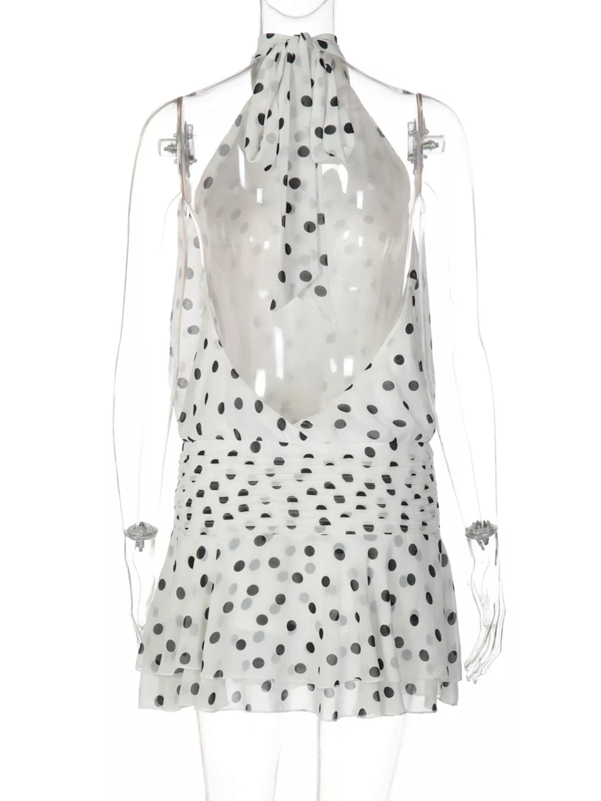 Tie fastening detail at the back of the halter dress