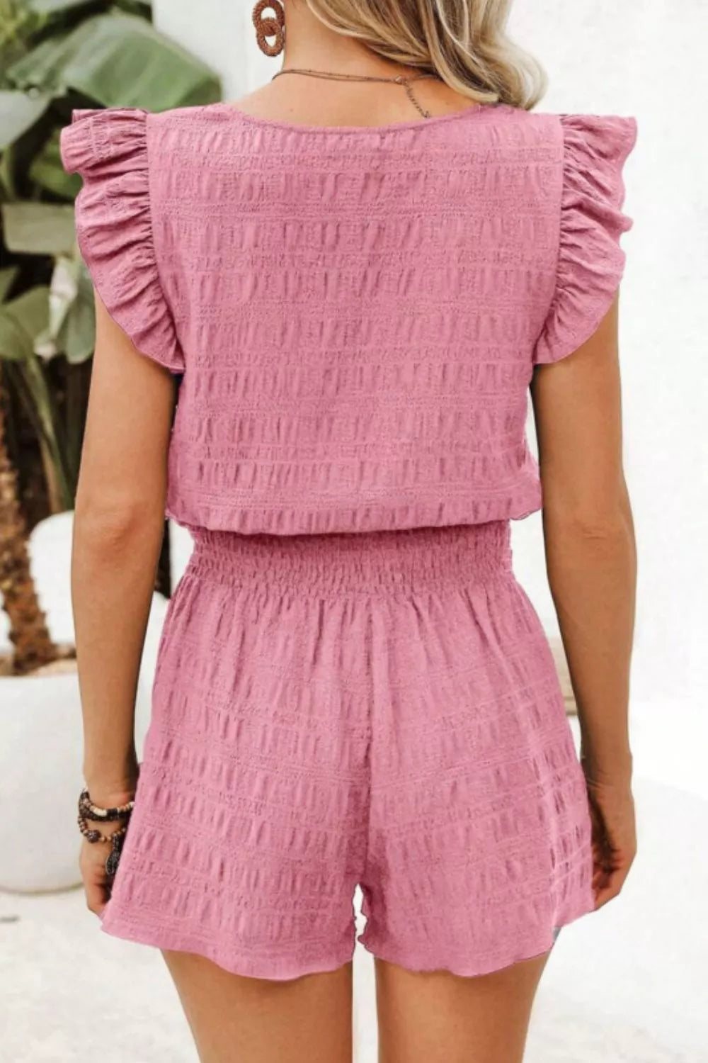Ruffled sleeve top and shorts set detail