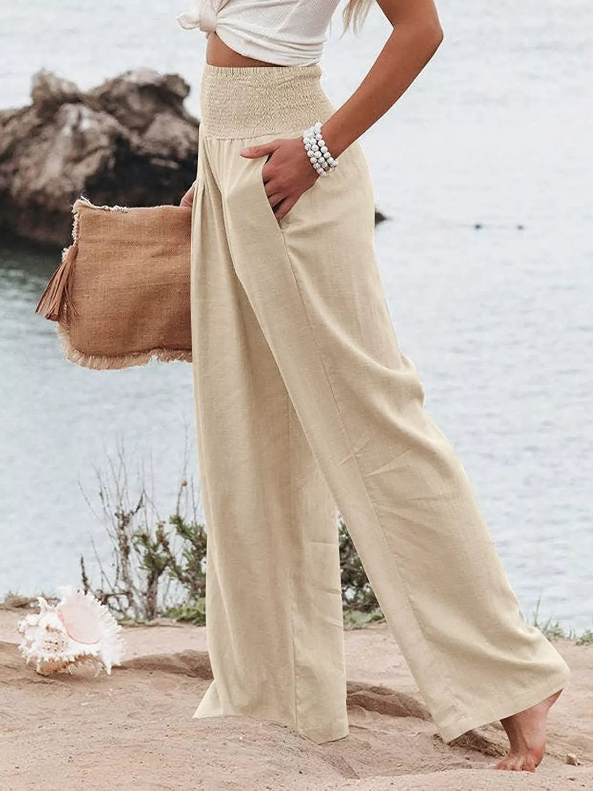 Smocked high waisted wide leg pants three quarter view