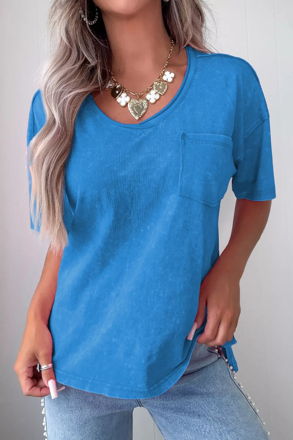 Blue pocketed short sleeve cotton tee front view