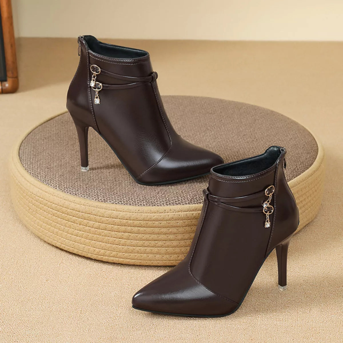Point toe stiletto ankle boots styled on model