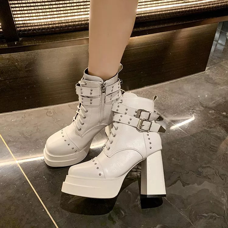 Round toe high block heel boots upper close up