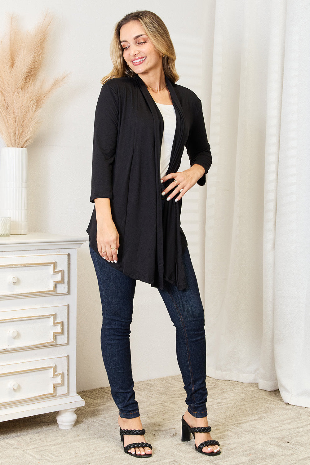 Black open front cardigan full length on model