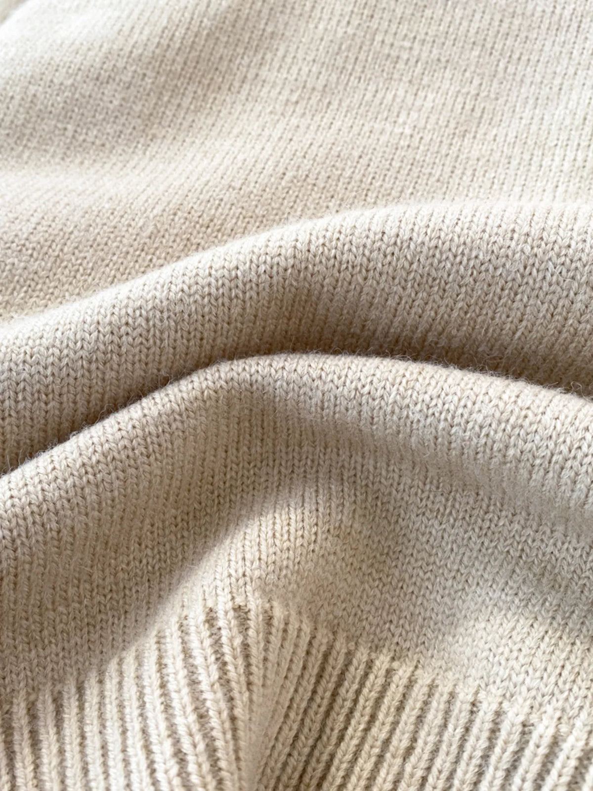 raw hem patchwork pocket cardigan sleeve and cuff detail