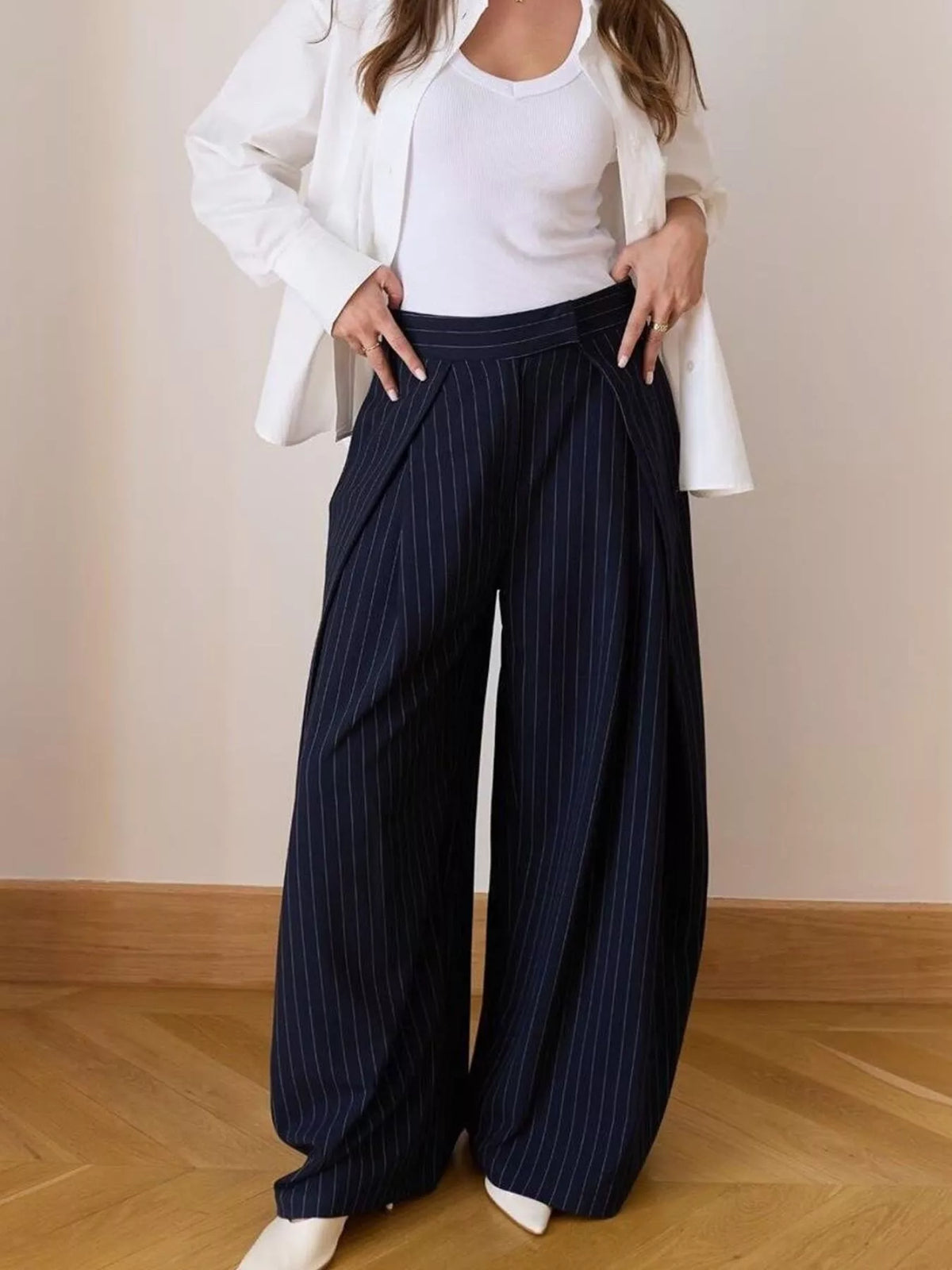 High waisted wide leg pants, front view on a model