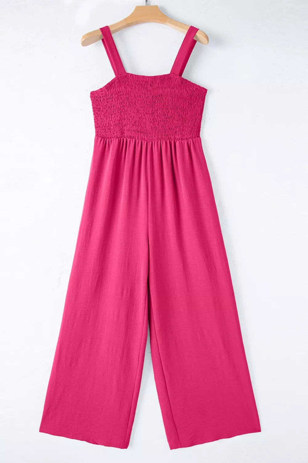 Side view of smocked jumpsuit