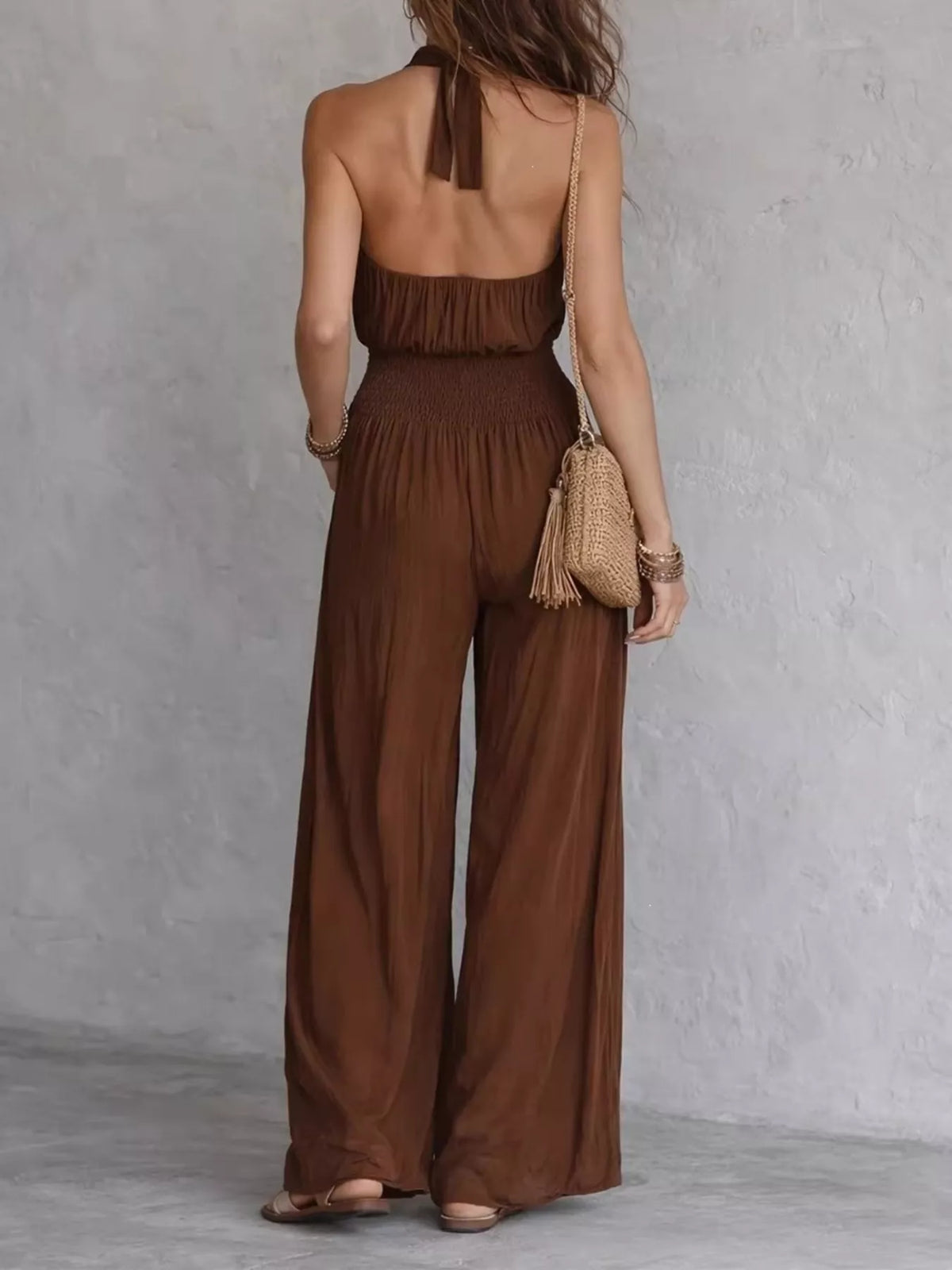 Halter neck wide leg jumpsuit full length view