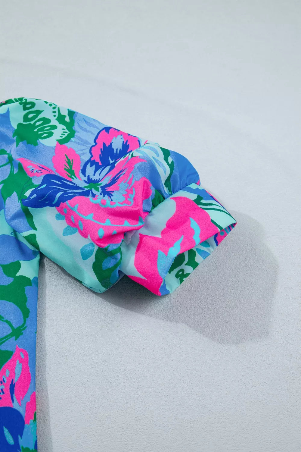 Floral V neck blouse hem detail