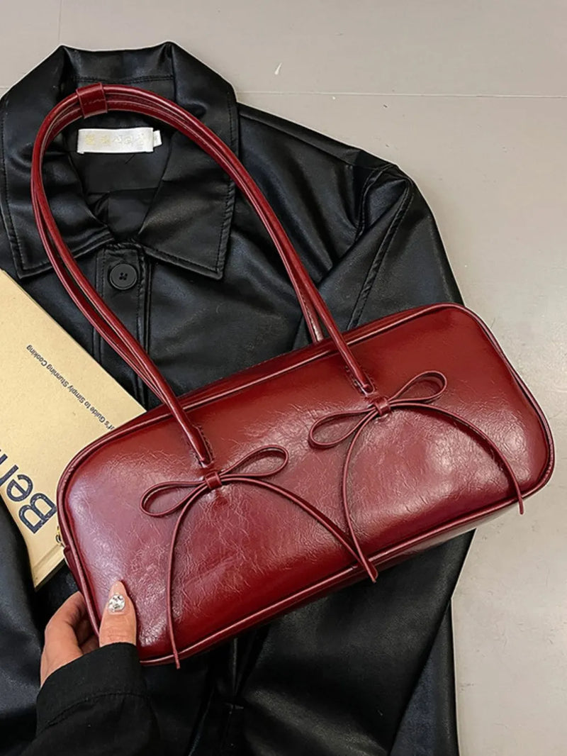 Bow trim PU leather baguette shoulder bag in burgundy