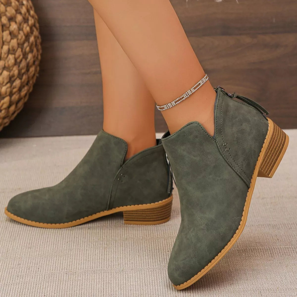 Point toe block heel ankle boots standing pair