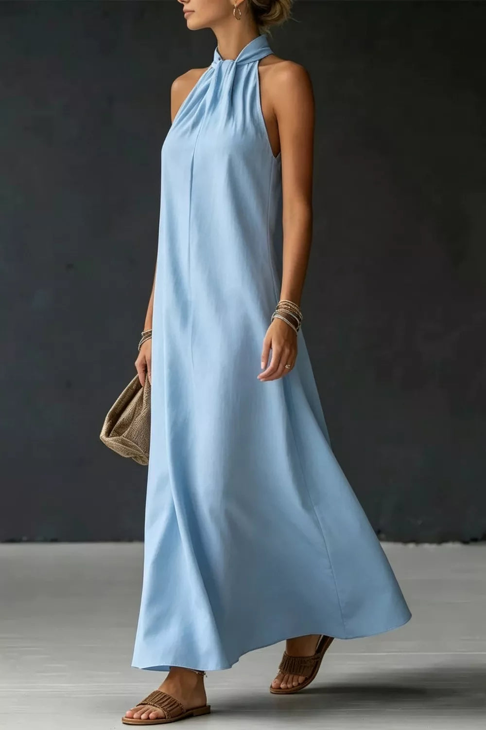 Halter neck sleeveless maxi dress with side slit side view