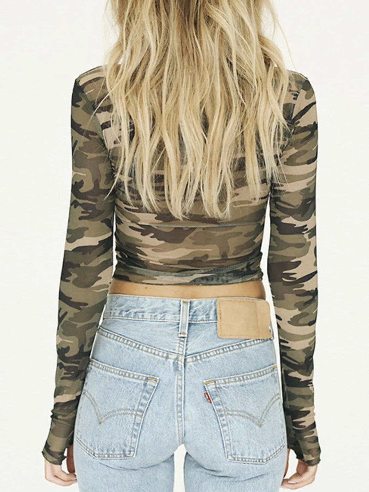 Detail of mesh sleeve cuff on camo long sleeve tee