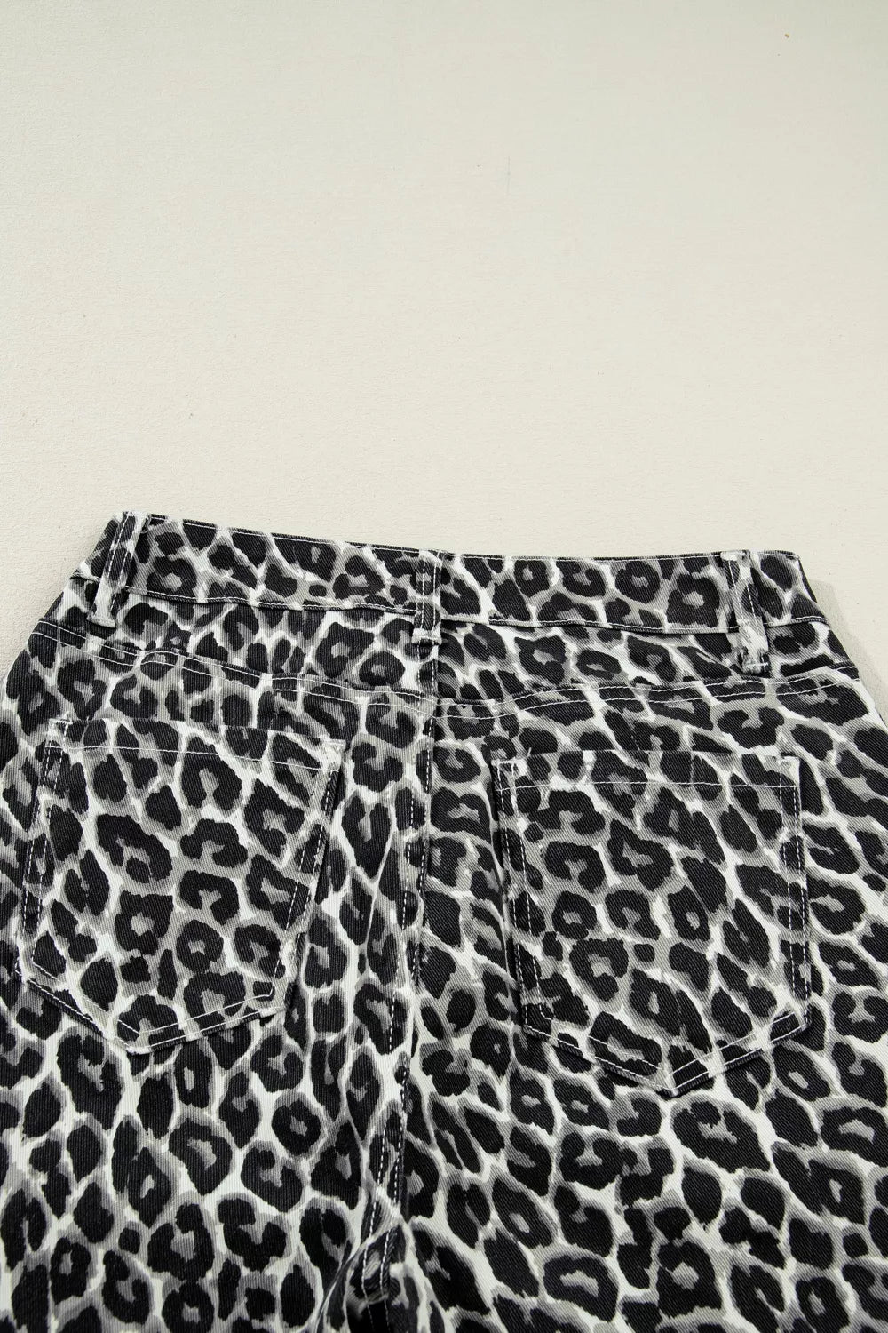 Leopard print jeans paired with basics